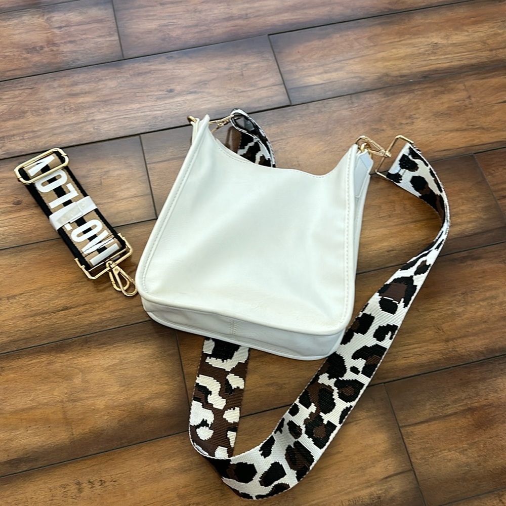 Ah dorned small crossbody bag with extra strap.